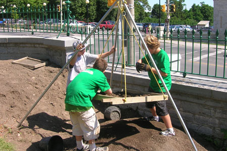 Third Year participants screening dirt at the Warden's Residence, 2011. Upper Year Participants screening dirt.