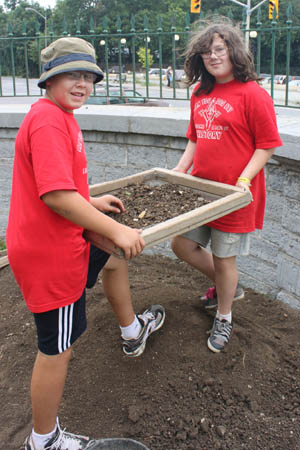 Upper year particpants screening for artifacts at the Warden's Residence 2010.