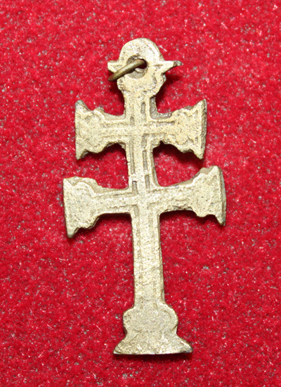 This Cross of Lorraine was excavated at the site of Fort Frontenac. Originating in the northeast of France, this double barred cross was associated with the ARchbishop of the Roman Catholic Church, the Knights of Templar, and the Dukes of Anjou. It is made from copper alloy and only measures 3.5 cm long. This Cross of Lorraine was excavated at the site of Fort Frontenac. Originating in the northeast of France, this double barred cross was associated with the ARchbishop of the Roman Catholic Church, the Knights of Templar, and the Dukes of Anjou. It is made from copper alloy and only measures 3.5 cm long.